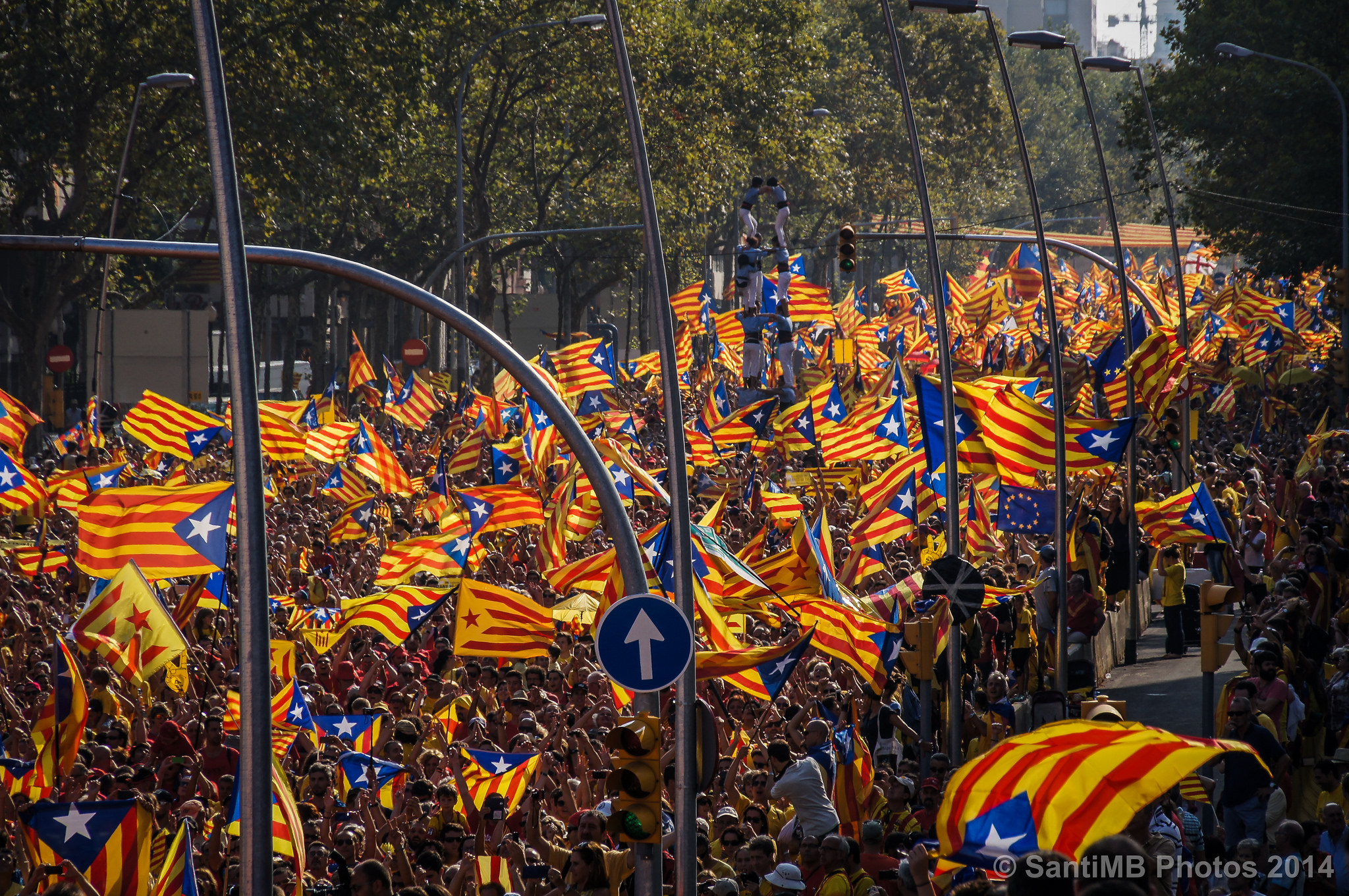 People marching for independence showing secessionist flags in Barcelona. Picture by SantiMB.Photos | Flickr