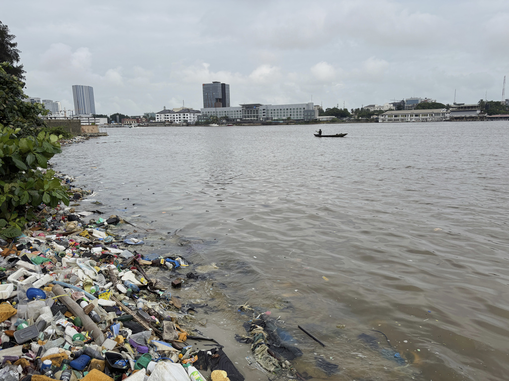 Fishermen in Lagos canoe